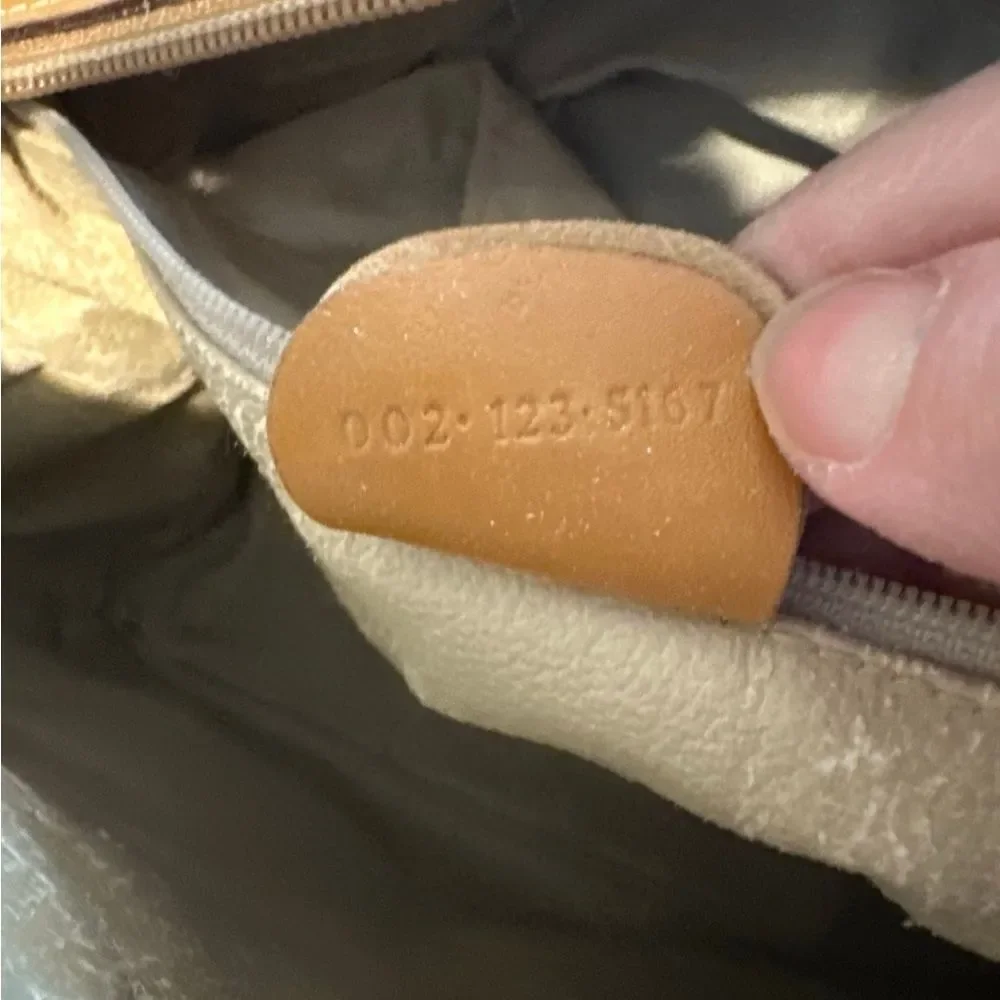 Gucci Beige Interior with Gold Accent